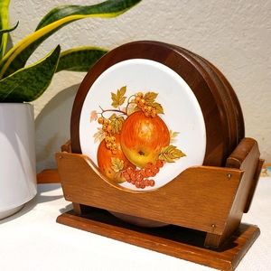 Vintage wooden/ceramic trivets.